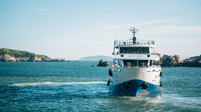 Small ferry boat in tropical location